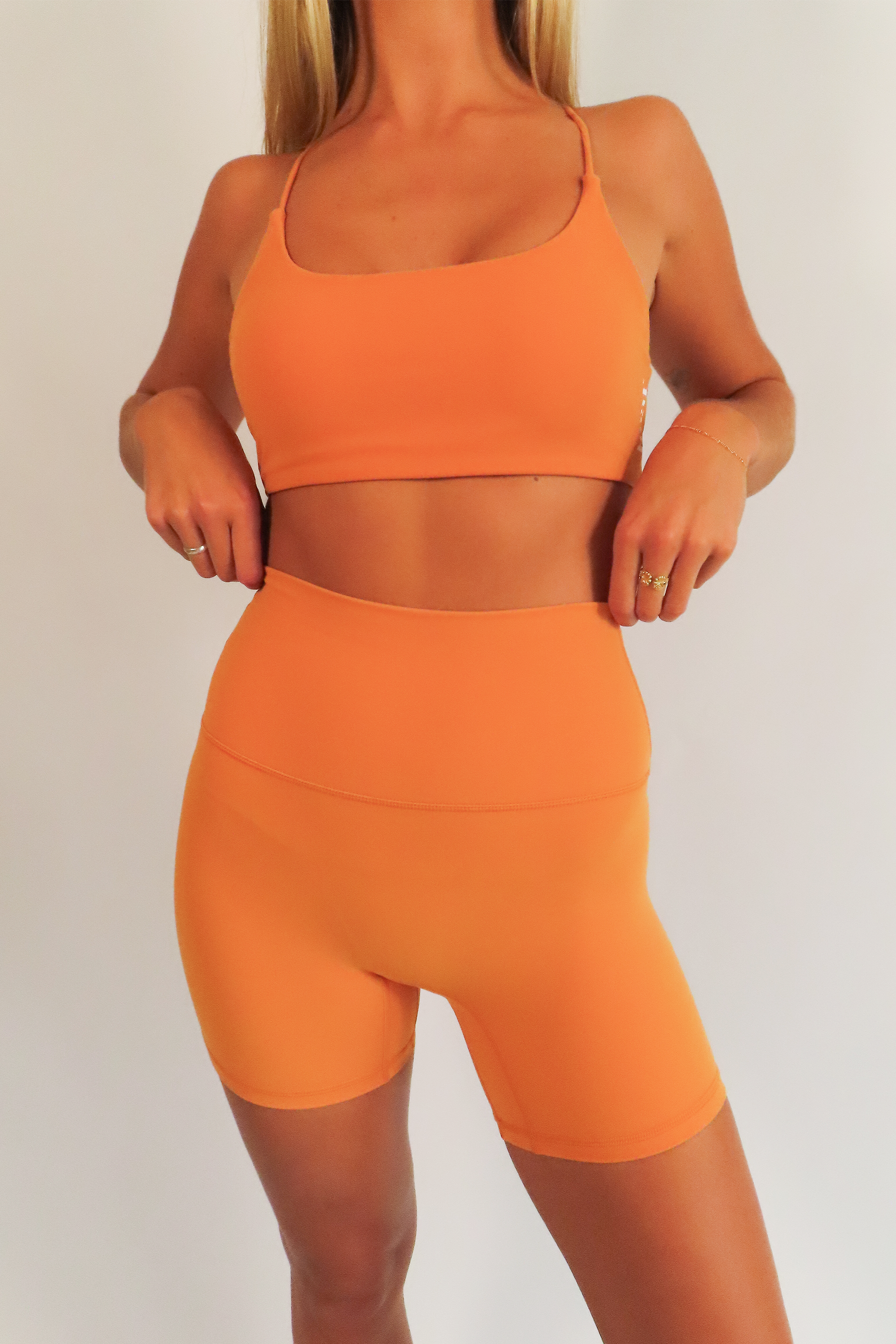 heat active essential open back strappy sports bra sunset orange set