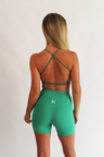 heat active essential open back strappy sports bra emerald green set